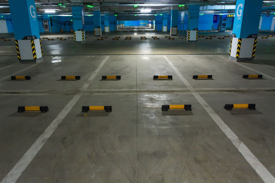 Commercial parking lot asphalt cracks deterioration